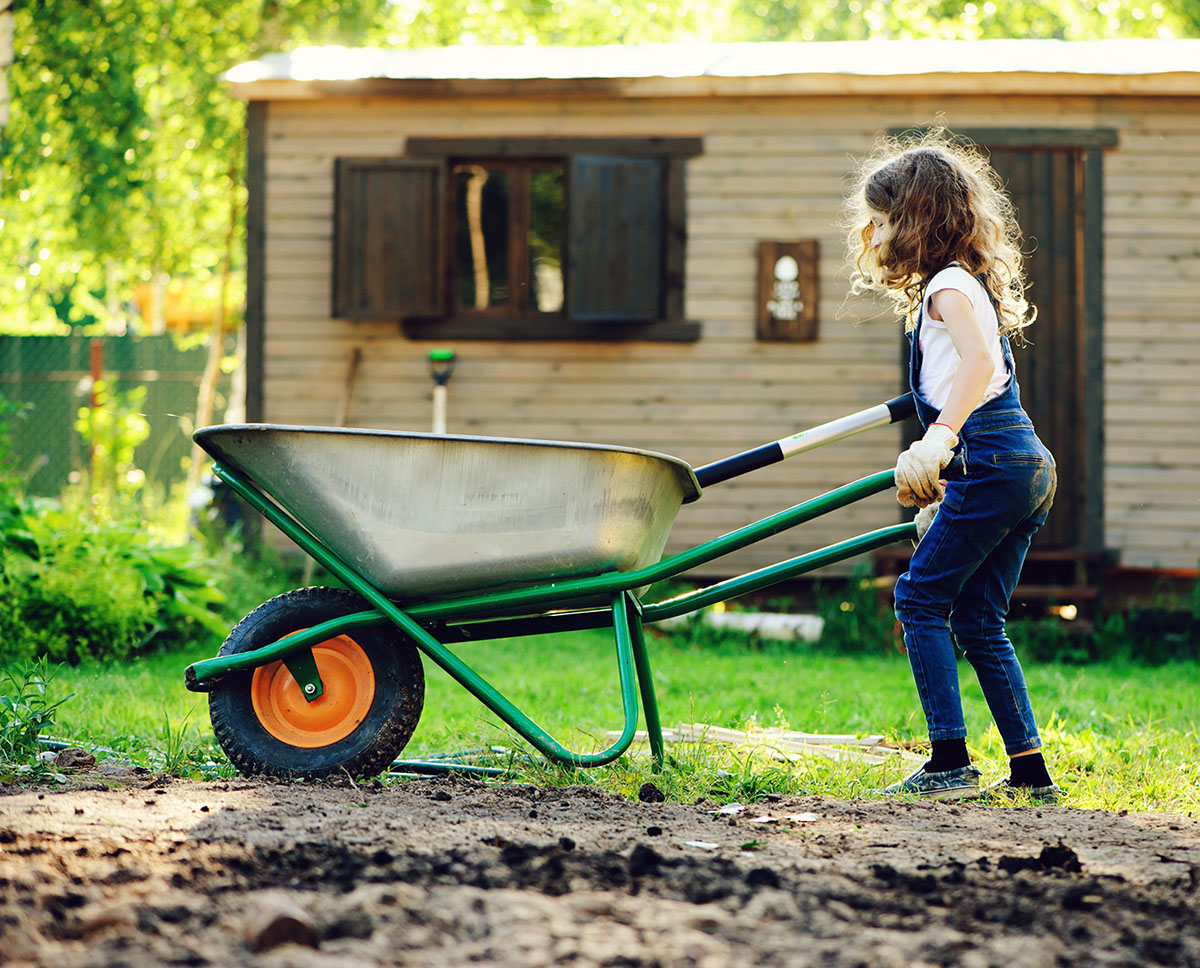 Girl with wheelbarrow